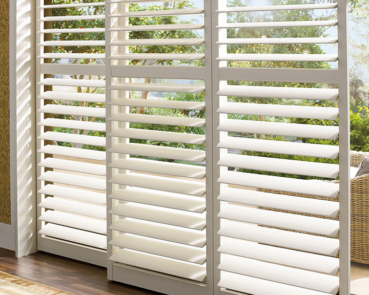 patio doors featuring white shutters