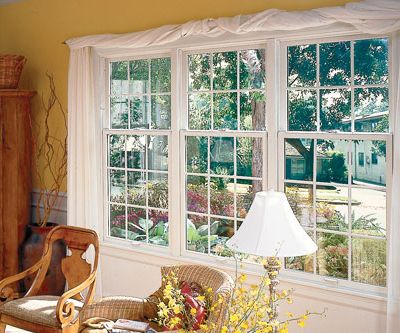 home interior living room double hung windows with decorative grilles
